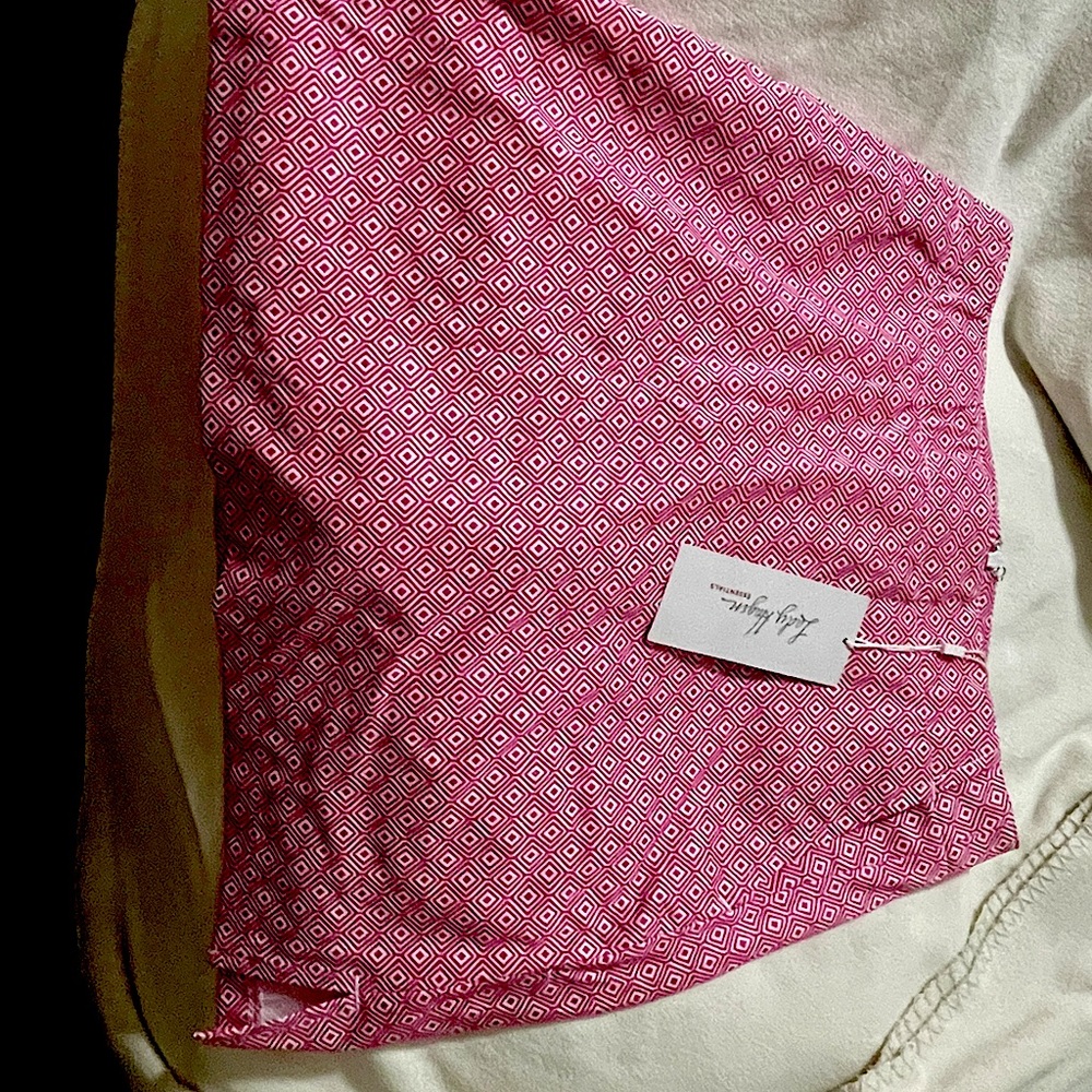 Lady Hagen Skort sz 0. NWT for tennis or golf. Fuscha and white.